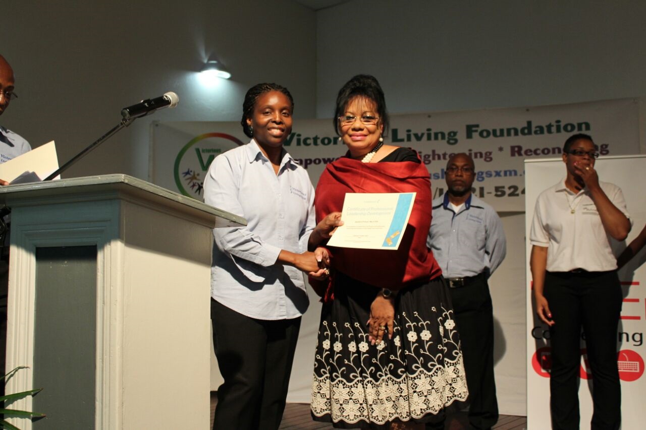 Participants receiving certificates at VLF Summit