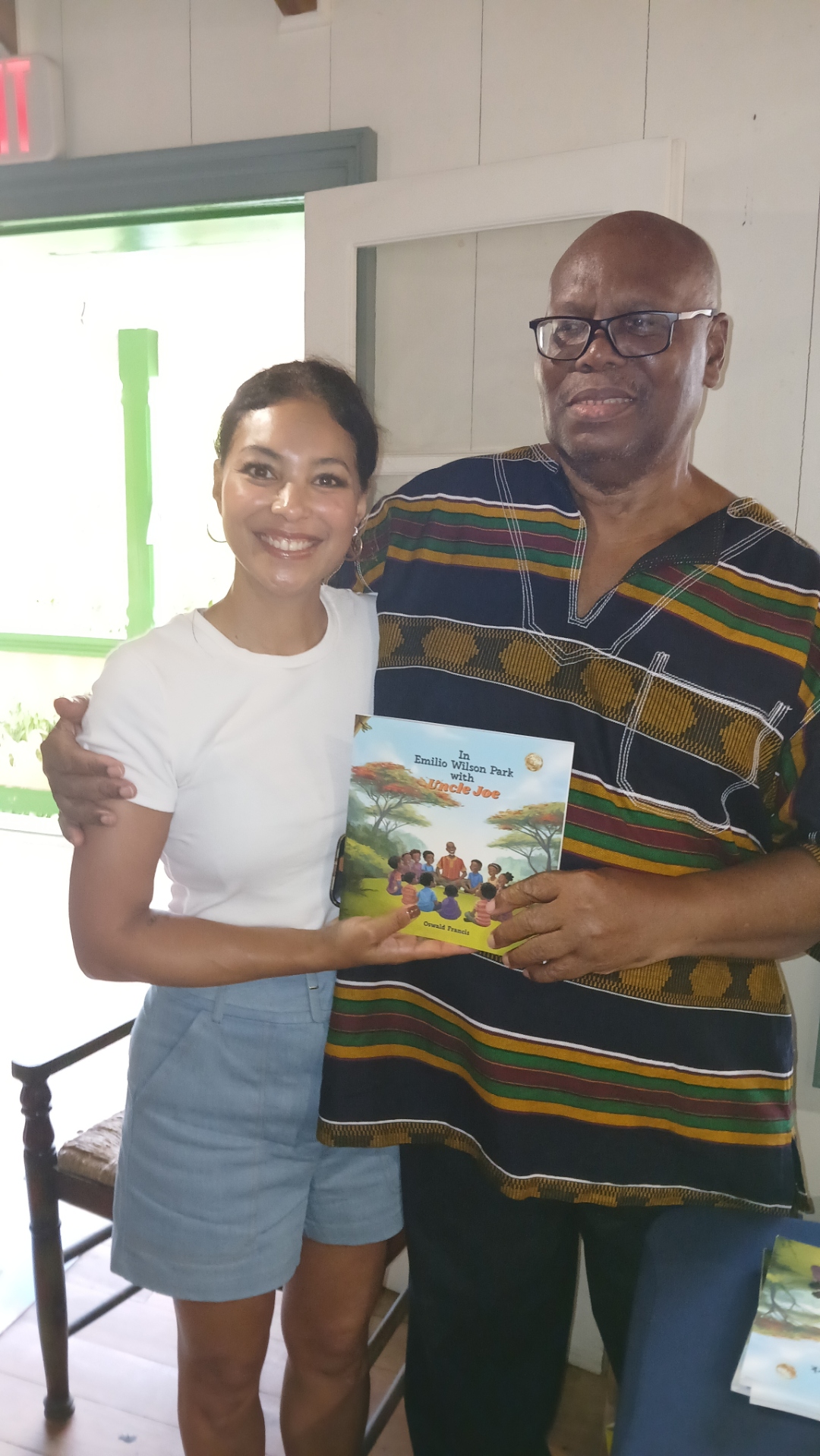 Guest and author Oswald Francis with the book