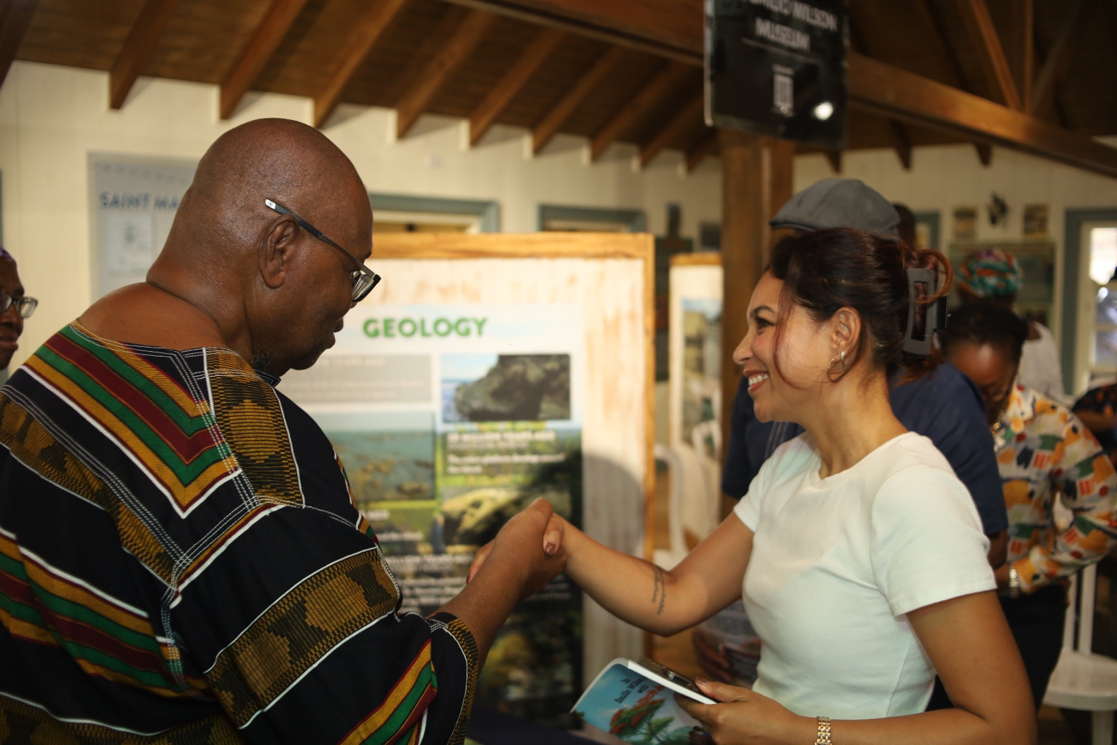 Author Oswald Francis thanking Pascalle Wong-A-Foe of Winair