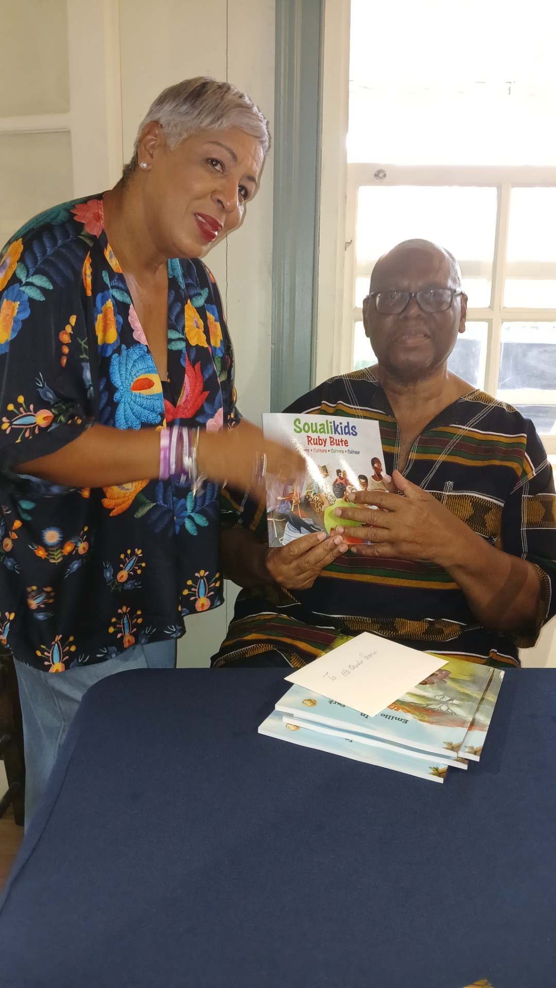 Exchanging books at the launch