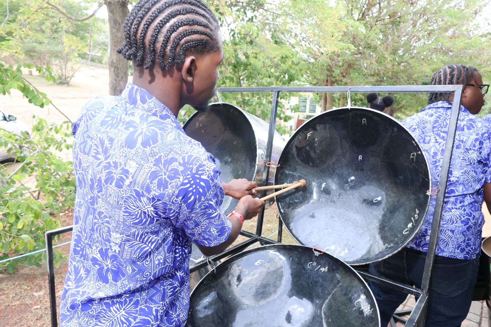 Dow's Steel Pan Orchestra youth playing sweet pan