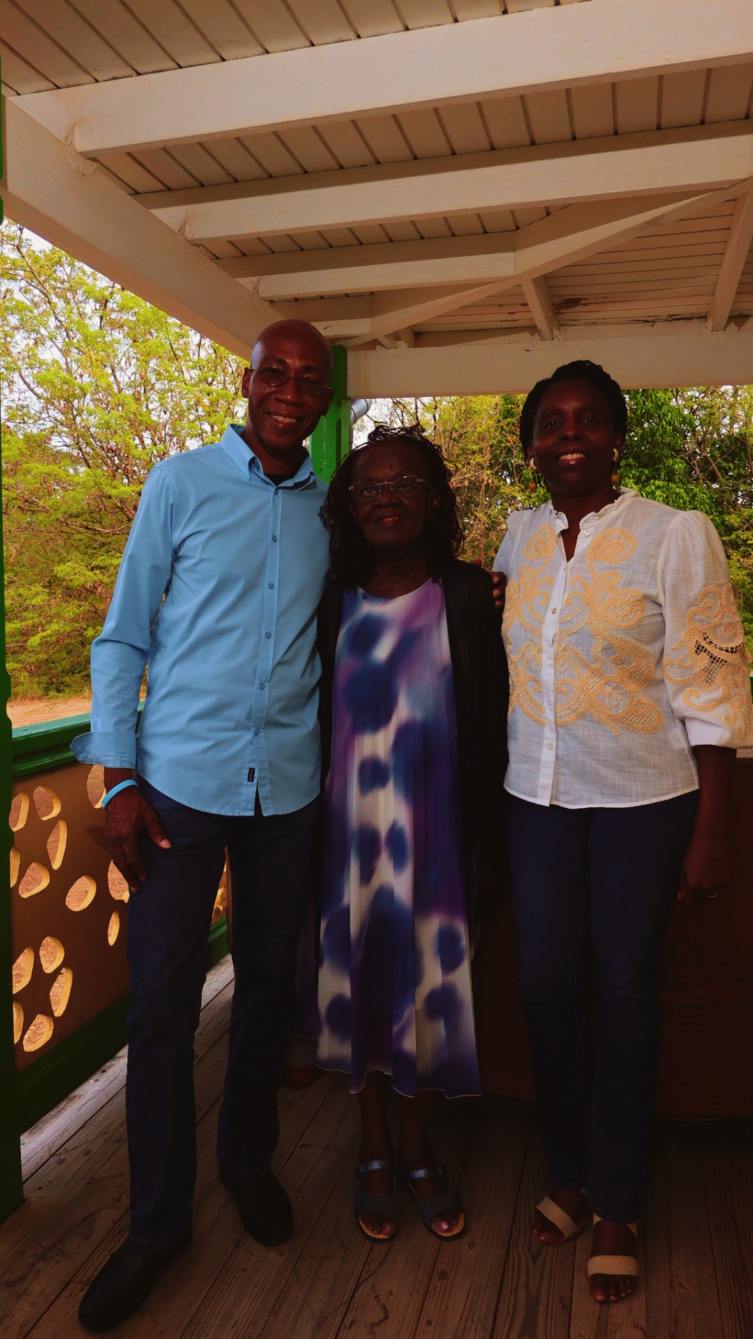 Roy Cotton Jr., music teacher Marva Richardson, and Dr. Nicole E. Francis Cotton